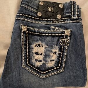 Women Miss Me Distressed Skinny Size 29/33 with Embellished Pocket.